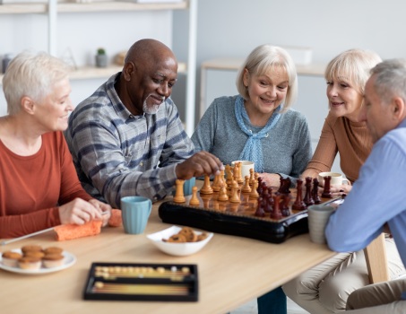 Senior group playing chess